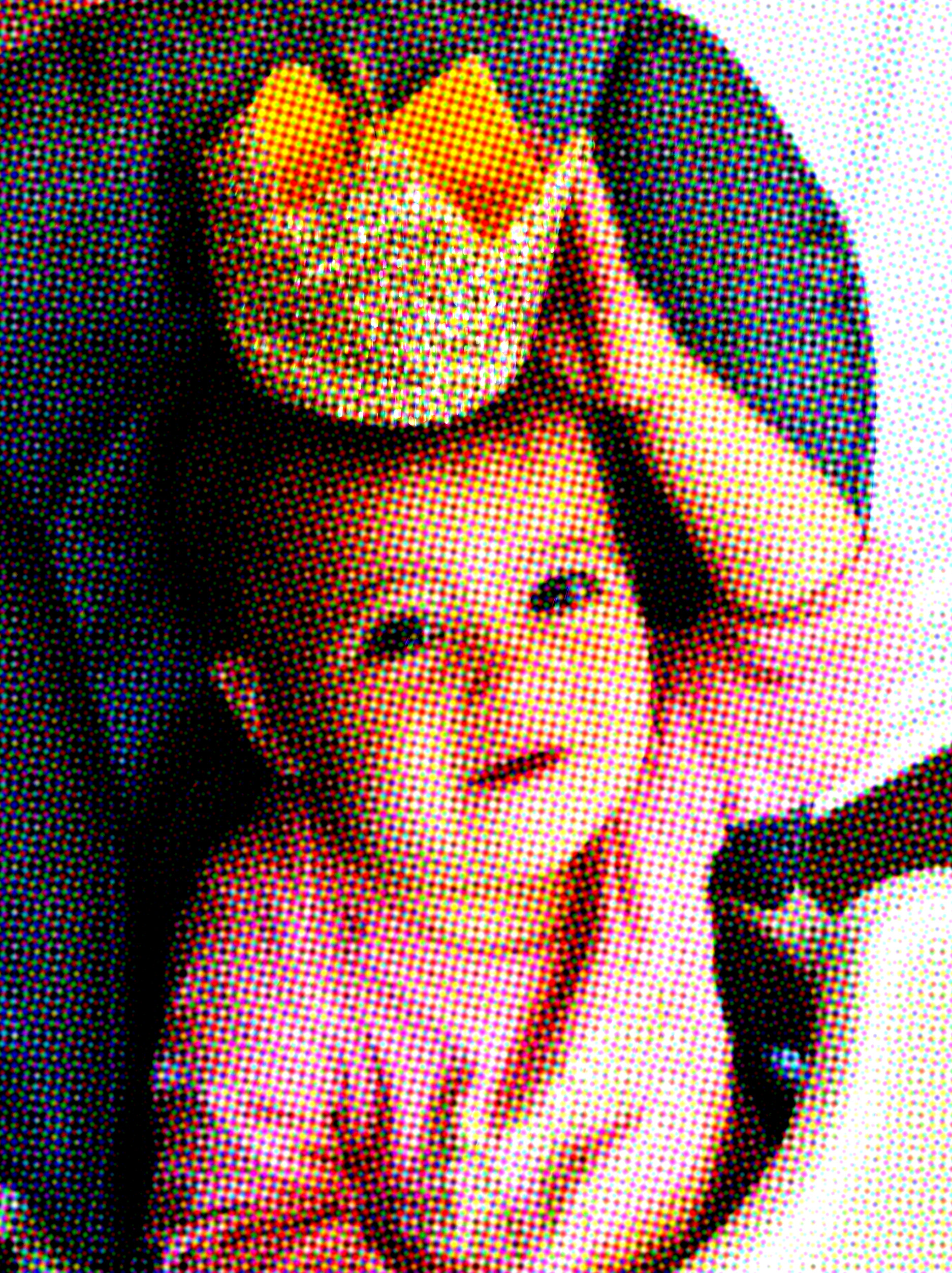 A baby in a chair holding a crown on her head.